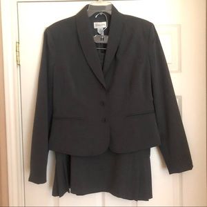 Chadwick’s gray skirt suit with pleated skirt. 12